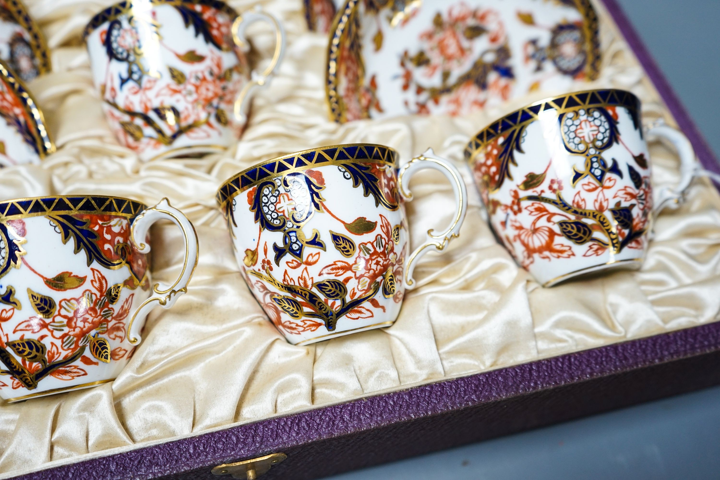 A cased Crown Derby Imari pattern coffee service
